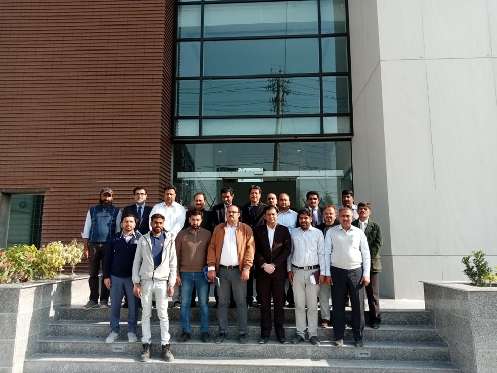 Ali Brothers project team outside the Bank Al Habib building